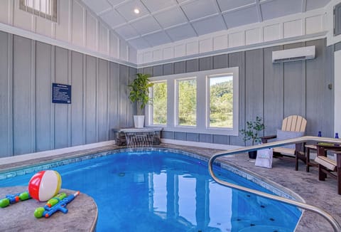 Dive into your private indoor heated pool and unwind in luxury any time of year with stunning mountain views.