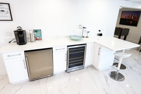 Coffee machine. Mini fridge and Wine fridge.