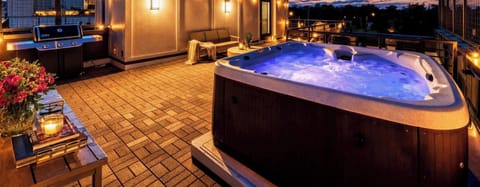 String lights and a starry sky turn a quiet night into the one everyone talks about after they leave, soak in the hot tub and watch the city glow