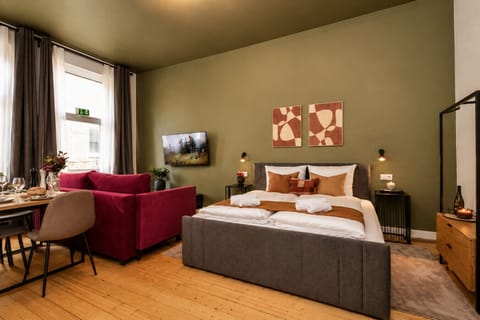Enjoy the comfort of this beautifully designed studio with premium bedding, a welcoming seating area, workspace, and modern amenities perfect for both business and leisure travelers.