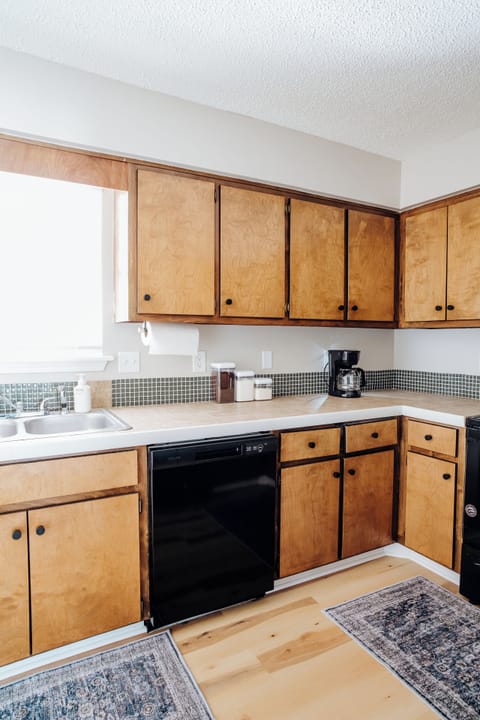Spacious kitchen with ample counter and cabinet space.