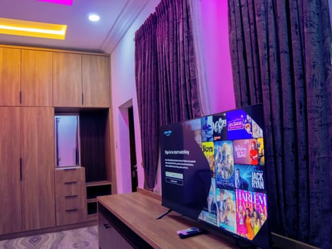 Presidential Penthouse, 1 Bedroom | Living area | 60-inch Smart TV with satellite channels
