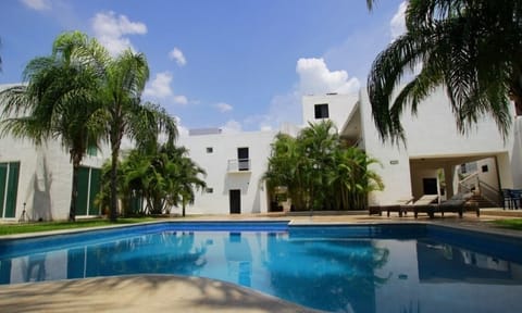 Dive into sunlit serenity with a sparkling resort-style pool.
