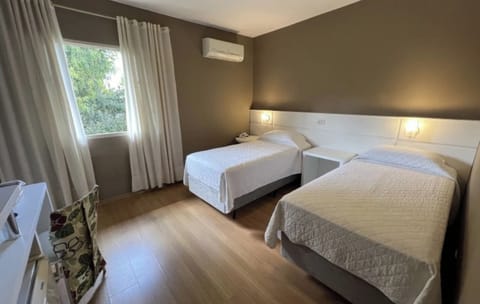 Wake up to soft daylight and a calm, airy room.