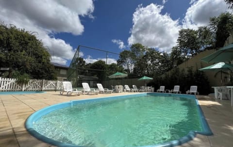 Soak up the sun beside crystal water and quiet greenery.
