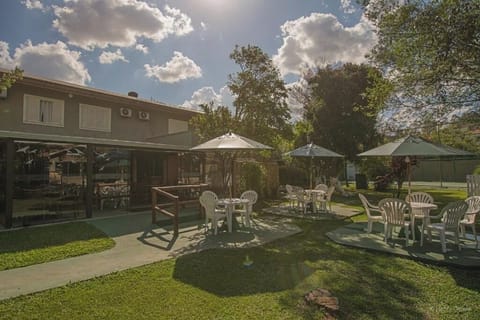 Soak up sunshine on the lawn with shaded tables nearby.