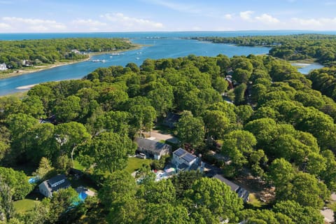 Nestled in a quiet wooded setting that captures the charm of Cape Cod living.