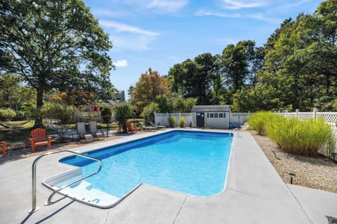 Sparkling pool with fenced-in privacy for family-friendly fun