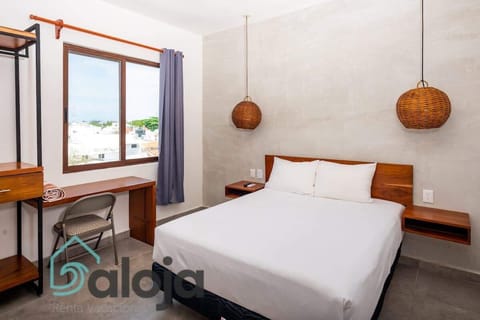 Habitación con vista a la ciudad con cama Queen Size