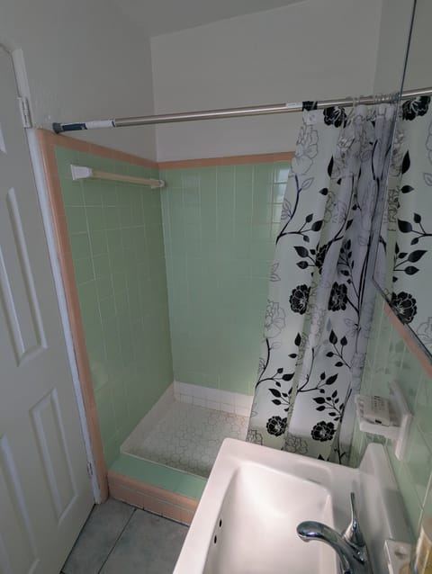 Economy Room, Beach View | Bathroom | Shower, free toiletries, toilet paper