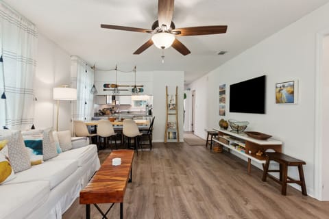 View of living room, dining area and kitchen