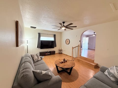 Living room with 2 sofas 
75 Inch Smart TV