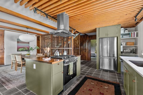 Step into the heart of the home — a modern kitchen where conversations flow as easily as the coffee.