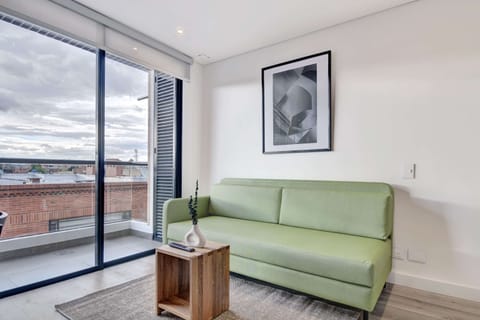 Cozy living room with sofa and wall art