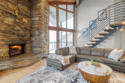 Bright living room with modern decor and a fireplace for a cozy retreat.