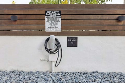 A pay-as-you-go EV charger is available on-site. 