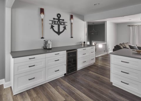 The sleek, open kitchen offers ample space & every home comfort​