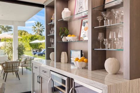 Cabinet with mini wine cooler in dining area