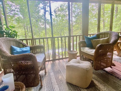 Great spot for your morning coffee - Glider rockers with a forest/lake view