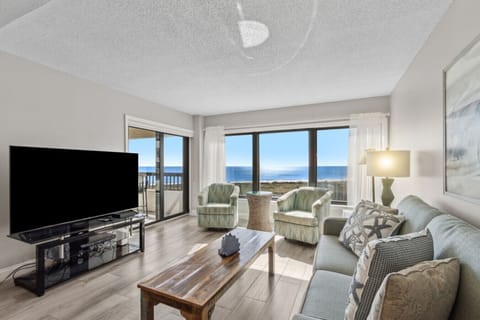 Living room with cable tv and ocean views