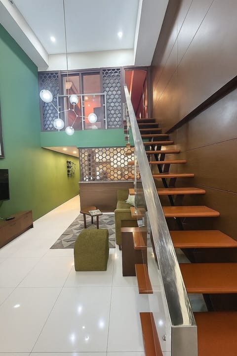 Relax in style downstairs, with your cozy master retreat just upstairs.