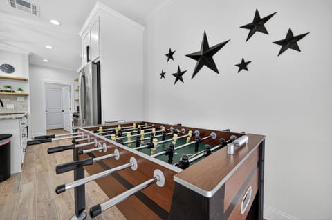 Fun-filled foosball table for endless entertainment with family and friends.