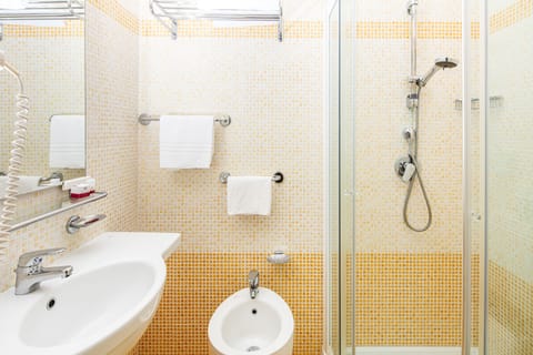 Shower, free toiletries, hair dryer, towels