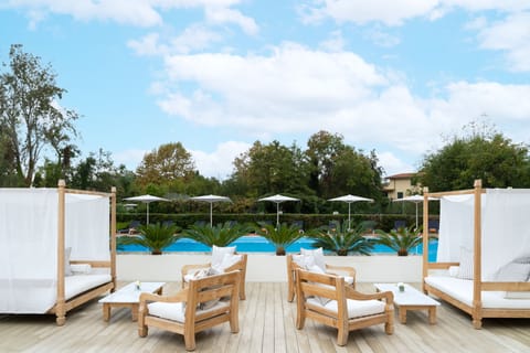 Seasonal outdoor pool, pool umbrellas, sun loungers