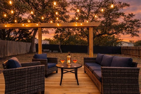 Enjoy the private fully-fenced backyard w/ a spacious deck & comfortable seating