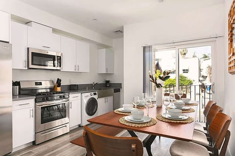 Fully equipped kitchen and dining area perfect for home-cooked meals.