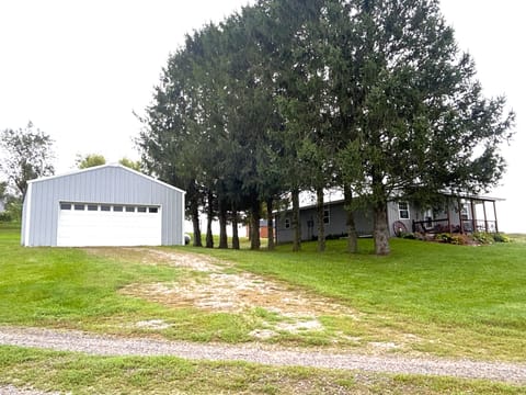 Park in front of garage enter through back door