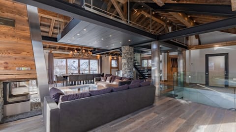 64-inch flat-screen TV with satellite channels, fireplace