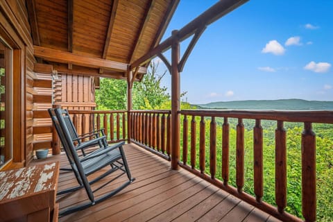 Start your mornings or wind down your evenings on the covered deck, rocking gently with a mug in hand, soaking in endless views of the Smoky Mountains.