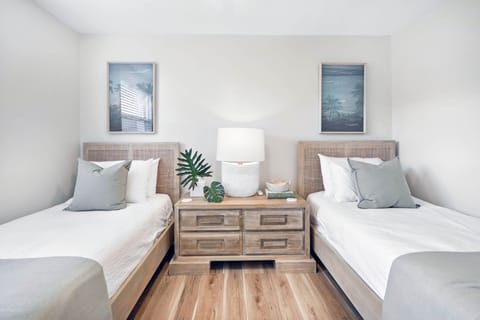 Convenient twin sized beds, ceiling fan, and closet.