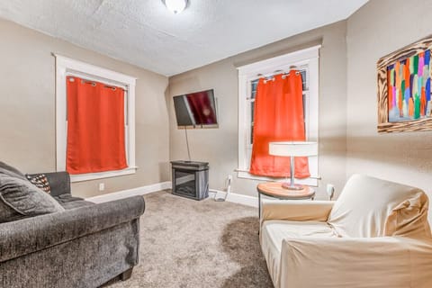 Stream your favorite shows on the mounted TV for a cozy night in.