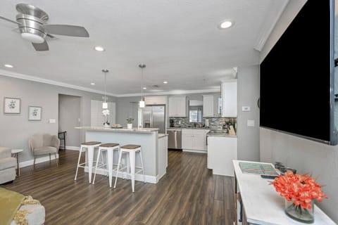 Cook together in a bright, open kitchen and enjoy casual meals at the breakfast bar.