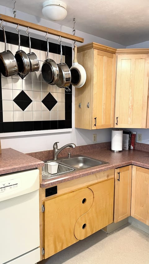 Fully stocked kitchen for cooking.