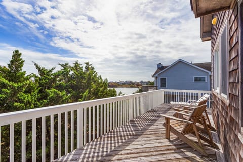 Soak up the sunshine and coastal breeze from the furnished deck—perfect for cocktails or stargazing.