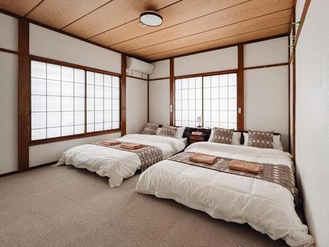 Family Triple Room | Blackout drapes, soundproofing, free WiFi