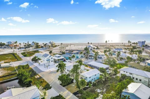 Steps to the white sandy beach and Amazing Sunsets