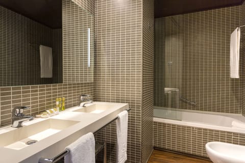 Eco-friendly toiletries, hair dryer, towels