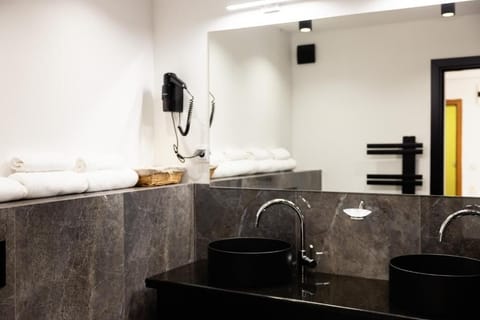 Panoramic Apartment, Balcony, Mountain View | Bathroom | Bathrobes, slippers, soap, shampoo