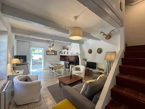 dining area, kitchen, table, living room, sofa, oven, TV