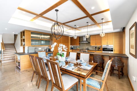 The open-concept kitchen and dining space is perfect for gathering and group meals.