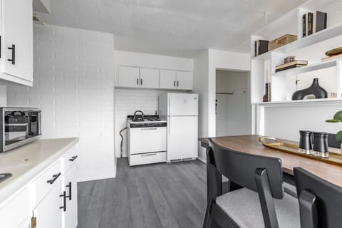 Full-Size Kitchen Appliances: Refrigerator and Gas Stove