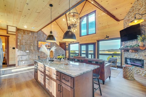 Luxury House, Non Smoking, Lake View | Living room | 50-inch Smart TV with digital channels, fireplace