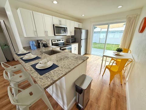 A kitchen with all the amenities to make your stay comfortable.
