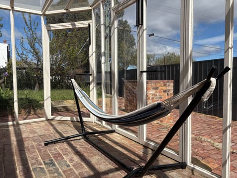 A perfect spot to unwind - relax in the hammock and bask in the gentle warmth of the sun.