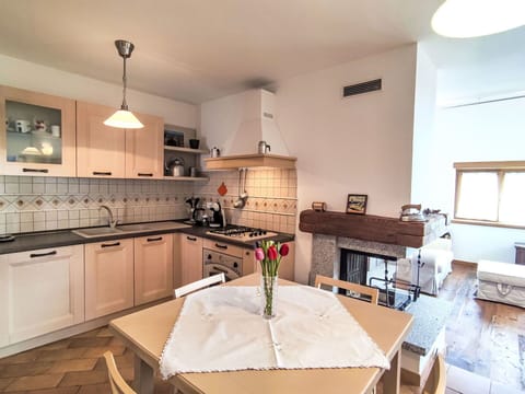 Furniture, Interior Design, Kitchen, Countertop, Flooring, Wood, Floor, Cabinetry, Kitchen Appliance, Ceiling