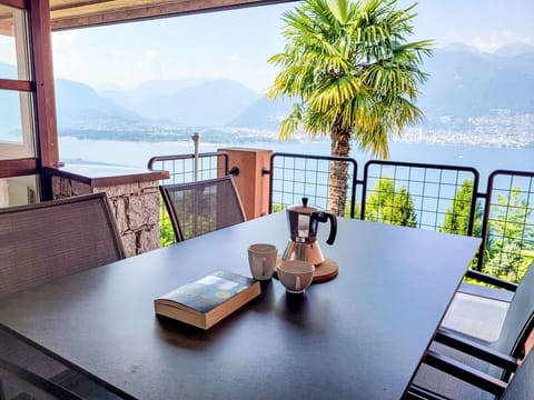 Furniture, Table, Chair, Coastal And Oceanic Landforms, Interior Design, Sea, Kitchen & Dining Room Table, Resort, Coast, Outdoor Furniture